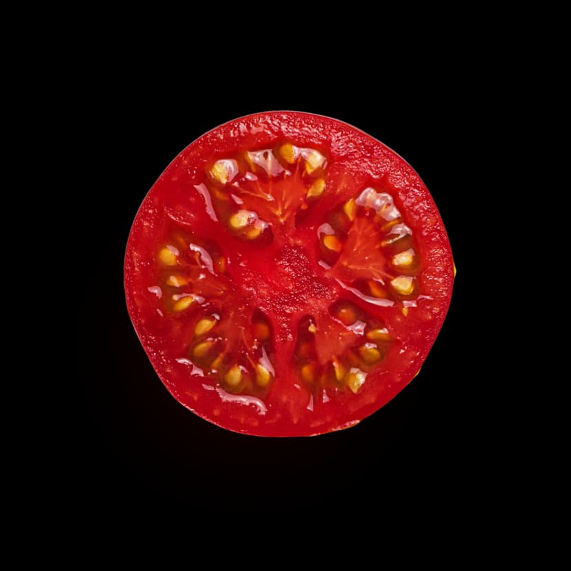 Red tomato cut in half